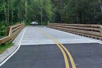 Steel-Backed Timber Guardrail Highway Bridge